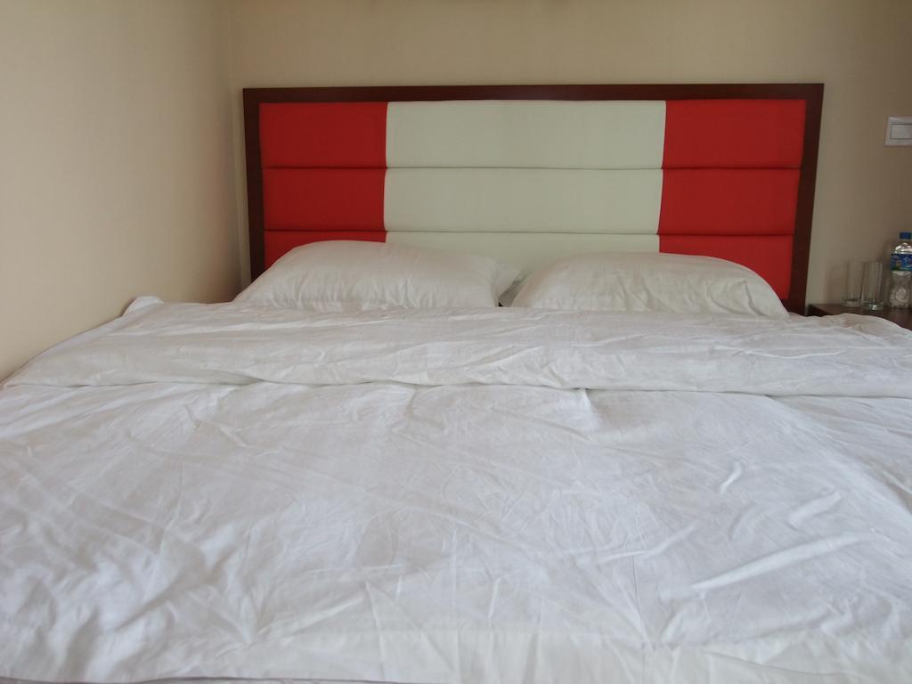 Chun Tian Hui Gu Holiday Hotel Kunming Quarto foto